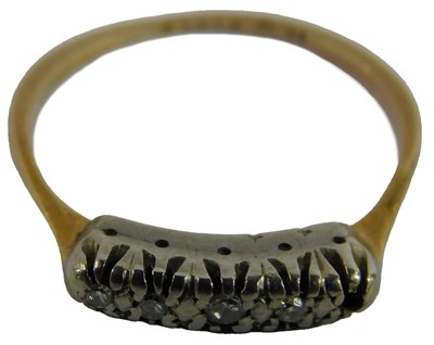 Lot 89 - An 18ct gold and five stone dress ring, one...