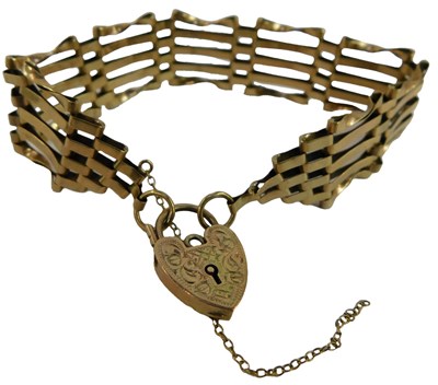 Lot 94 - A 9ct gold gate link bracelet, on a...