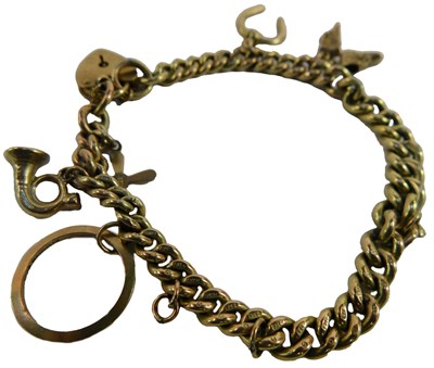 Lot 2 - A 9ct gold curb link charm bracelet, with five...