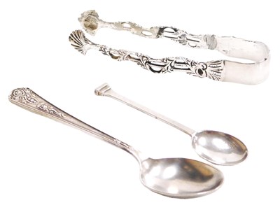 Lot 154 - A pair of George V silver sugar tongs, with...