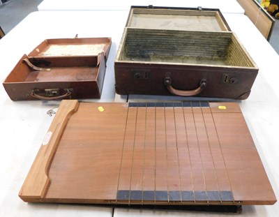 Lot 2009 - A small leather suitcase, a leather-bound...