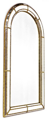 Lot 2252 - A modern arched wall mirror, the border formed...