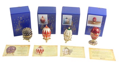 Lot 1152 - Four Atlas Editions collectors eggs, to...