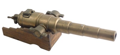 Lot 1178 - A brass cannon and carriage, the cannon, 46cm...