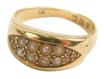 Lot 438 - An 18ct gold memorial ring, set with six...