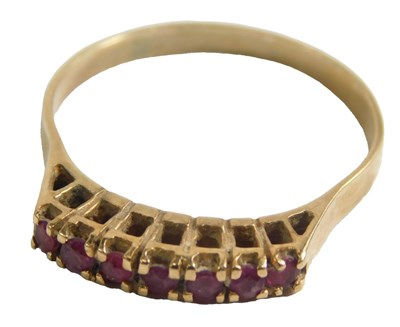 Lot 443 - An 18ct gold half hoop dress ring, set with...