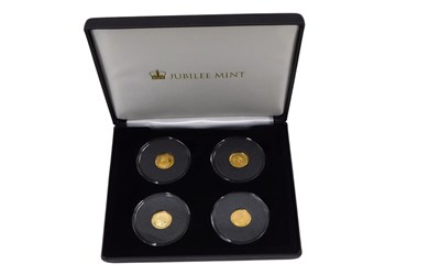 Lot 1264 - A set of four Tristan Da Cunha 9ct gold coins,...