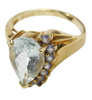 Lot 239 - A 9ct gold aquamarine and amethyst dress ring,...