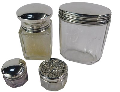 Lot 284 - A group of dressing table jars, to include a...