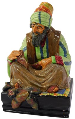 Lot 25 - A Royal Doulton figure modelled as The Cobbler,...