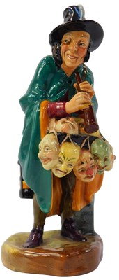 Lot 26 - A Royal Doulton figure modelled as The Mask...