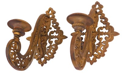 Lot 364 - A pair of cast brass wall mounted candle...