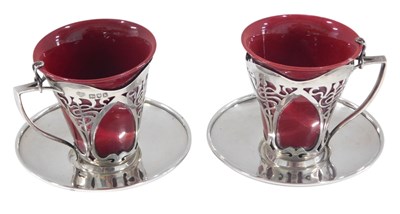 Lot 1309 - A pair of Royal Doulton flambe cups, of...