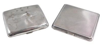 Lot 1316 - A George VI engine turned silver cigarette...