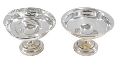 Lot 1317 - A pair of Edward VII silver stands, each with...