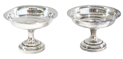 Lot 1318 - A pair of Edward VII silver stands, each with...