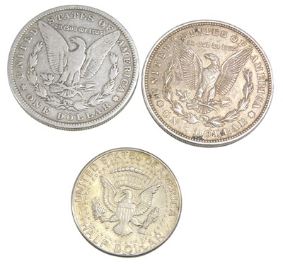 Lot 1320 - An American 1881 silver dollar, a 1921 silver...