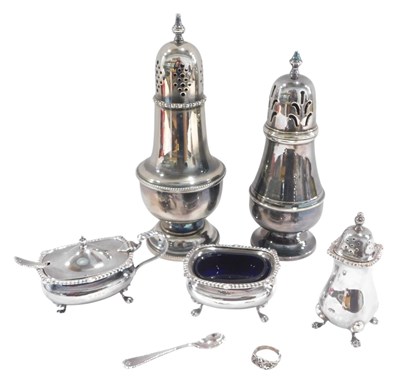 Lot 1331 - An associated three-piece silver cruet,...
