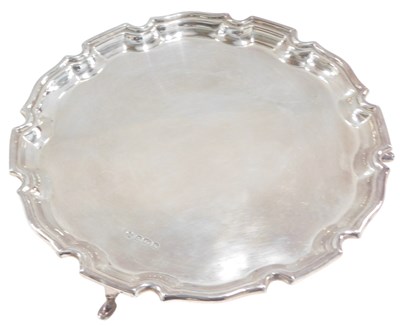 Lot 1337 - An Elizabeth II silver salver, with pie crust...