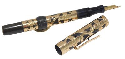 Lot 1344 - A Konklin fountain pen, with gold coloured...