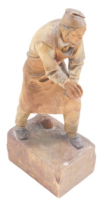 Lot 1348 - A Swiss carved wood figure of a gentleman...