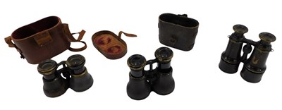 Lot 1377 - Three pairs of field glasses, to include a...