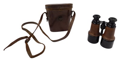 Lot 1378 - A pair of ebonised and simulated leather field...