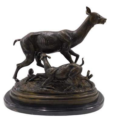 Lot 1441 - A modern bronze figure of a deer and fawn, in...