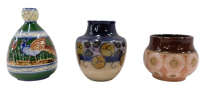Lot 1450 - An Art pottery vase, decorated with birds, on...