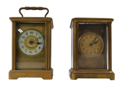 Lot 1455 - Two similar French brass carriage time pieces,...