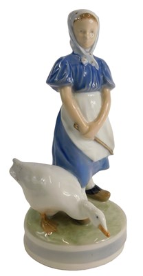 Lot 1490 - A Royal Copenhagen porcelain figure of a young...
