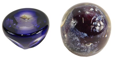 Lot 1498 - A purple glass paperweight, engraved with a...