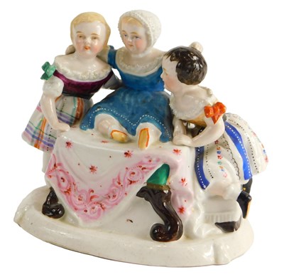 Lot 1504 - A late 19thC porcelain figure group, modelled...