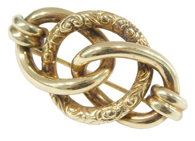 Lot 1015 - A Continental yellow metal brooch, embossed...