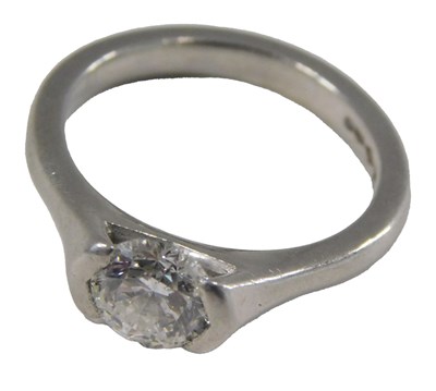 Lot 431 - A platinum and diamond solitaire ring, the...