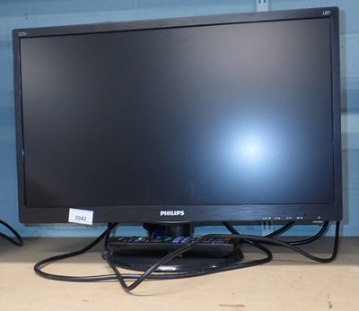 Lot 3042 - A Phillips 21" LED screen, with lead and remote.