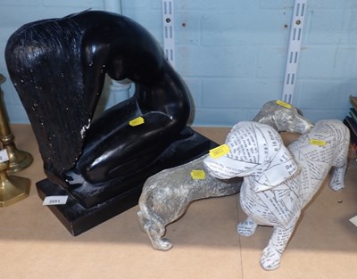 Lot 3051 - Two resin figures, modelled as dachshunds,...