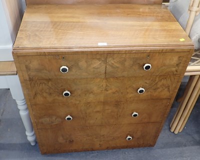 Lot 2504 - A 20thC walnut chest, of two short and three...