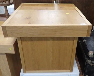 Lot 2511 - A John Lewis oak coffee table, the square top...