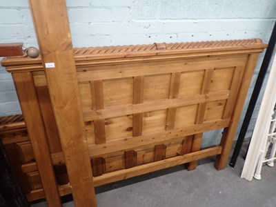 Lot 2514 - A pine double bedframe, comprising headboard,...