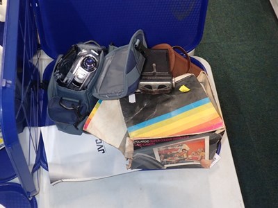 Lot 3069 - A group of cameras, to include a Polaroid land...