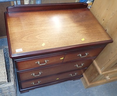 Lot 2558 - A chest of drawers, with raised back, above...
