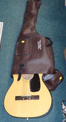 Lot 3132 - An acoustic guitar, with carrying case.