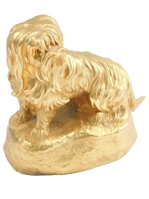 Lot 467 - Cainach. A gilt composition figure of a dog,...
