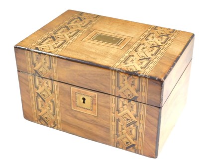 Lot 483 - A Victorian walnut and parquetry workbox, the...