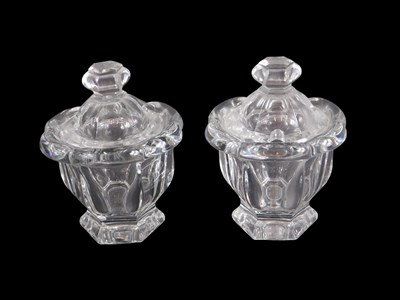 Lot 518 - A pair of Baccarat glass jars and covers, each...