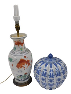 Lot 532 - A Chinese porcelain vase, decorated with koi...