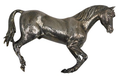 Lot 539 - A white metal model of a horse, 2.79oz, 10cm...