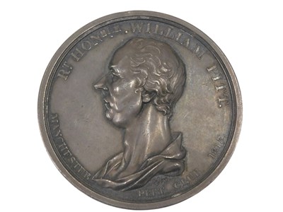 Lot 349 - A silver coloured metal medallion, modelled...