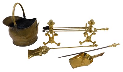 Lot 1475 - A quantity of brass, to include fire dogs,...